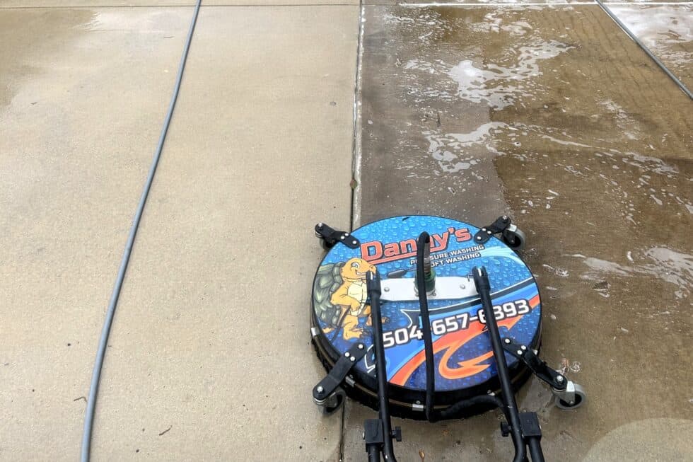 a surface cleaner pressure washing concrete